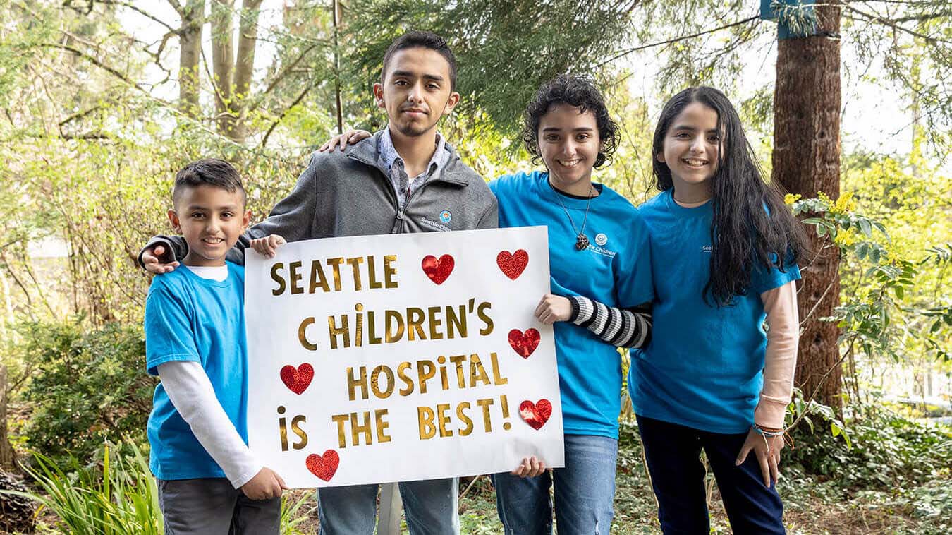 Children holding sign that reads Seattle Children's Hospital is the Best!