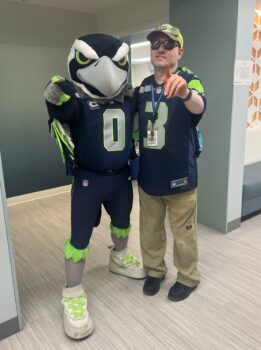 Blitz poses with a young man