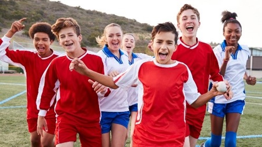 Children playing in the park, being healthy.