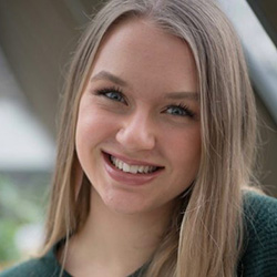 A girl poses for a camera