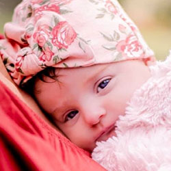 A baby in pink