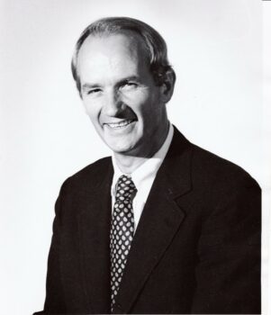 A black and white photo of a man