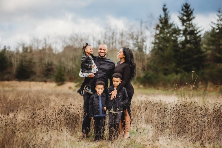 A family standing in a field