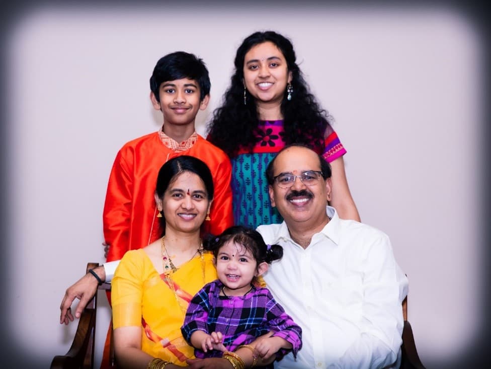 Sirish poses with his family.