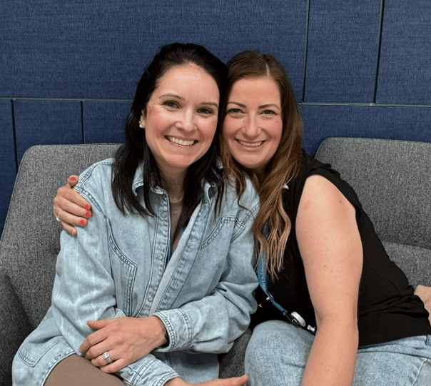 Two smiling women