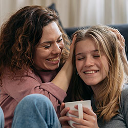 Mom and teen connecting and relaxing.