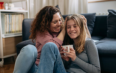 Mom and teen connecting and relaxing.