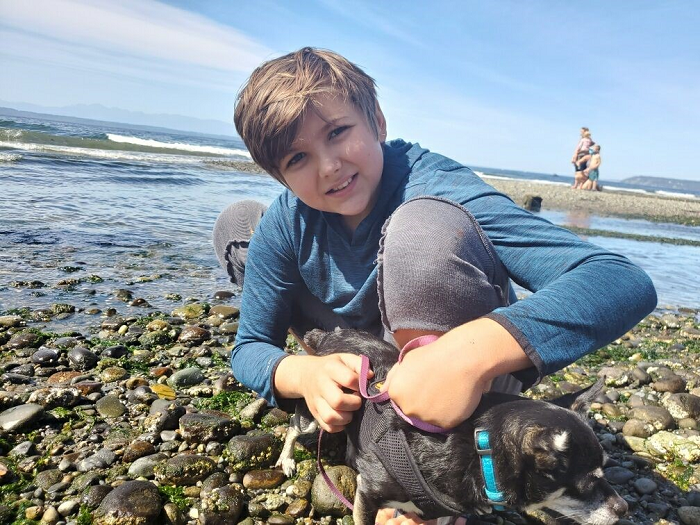 Xander and Tuft the puppy at Meadowdale Beach