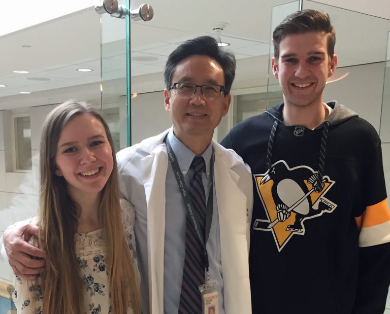Kaitlyn and Ryan Wyckoff travel from their hometown of Wasilla, Alaska, to Seattle Children’s so Dr. Sihoun Hahn (center) can monitor and treat them for Wilson disease — a rare genetic disorder.