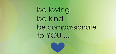 A green rectangle with the words be loving, be kind, be compassionate to YOU above a blue heart
