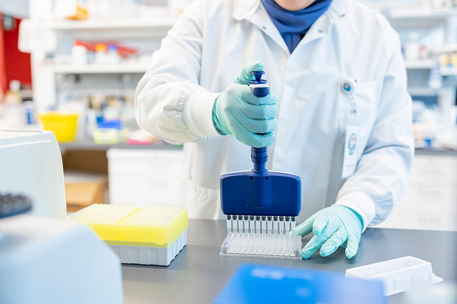 A scientist working in the lab