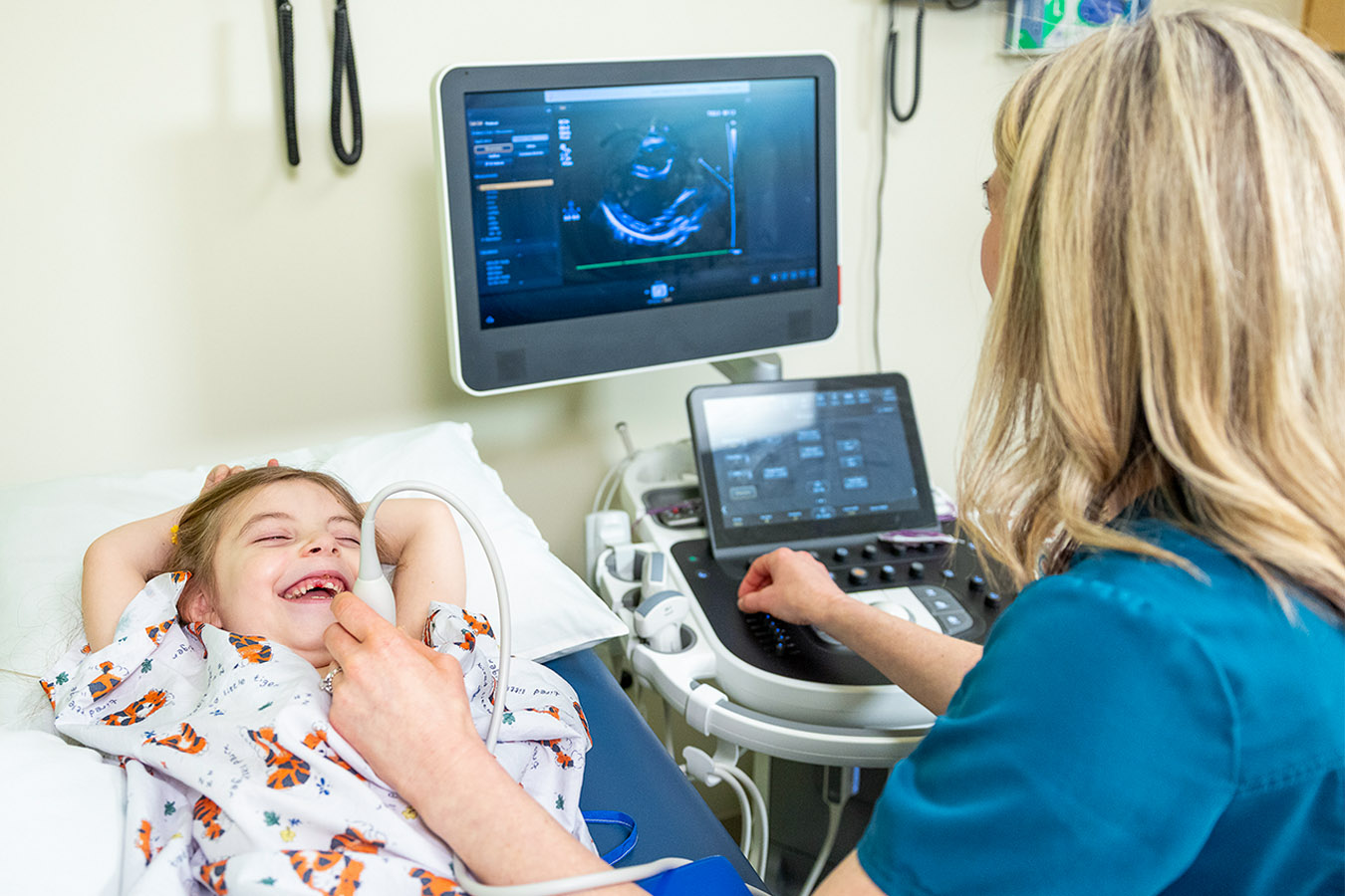 Smiling patient getting an ultrasound