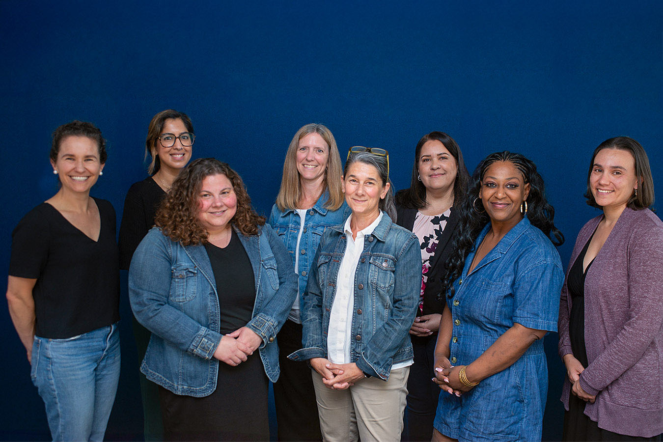 A group of professionals pose for a picture