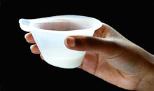 Hand holding a NIFTY cup