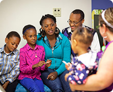The Davison family A family of five speaks with a nurse