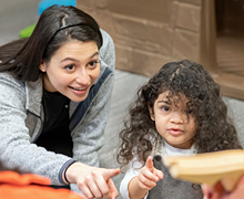 Stephanie Grillo and Eiger A behavior technician works with a client