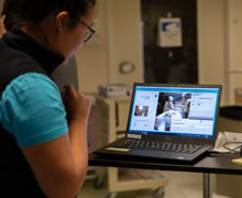 Oliver polar bear Provider looking at a computer screen for a telehealth appointment