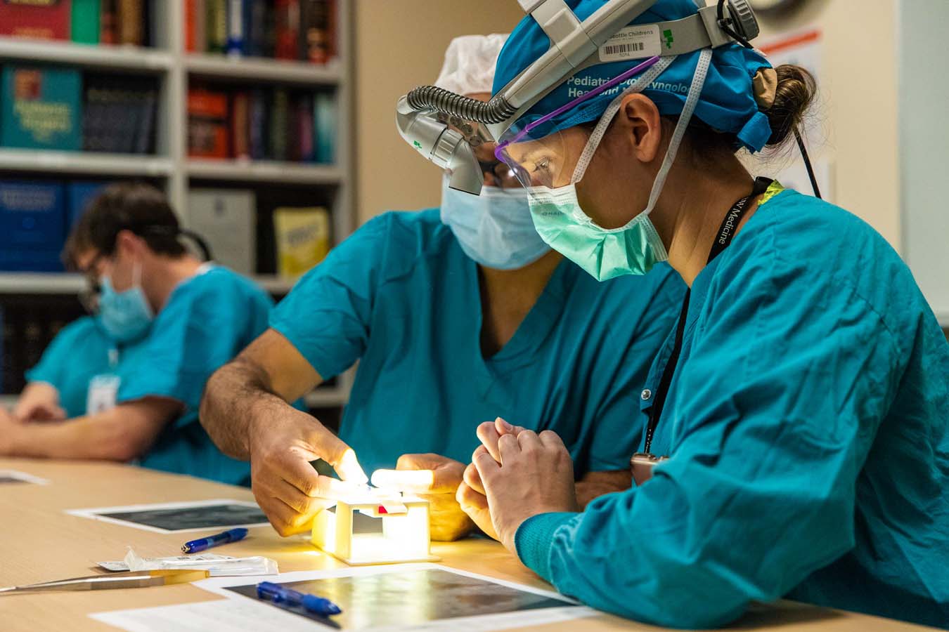Providers preparing for surgery with 3D model