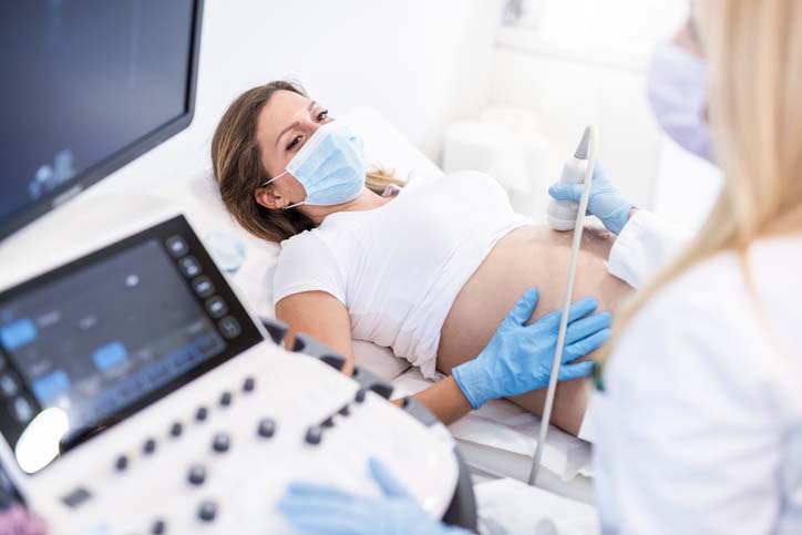 An expectant mother receives an ultrasound test