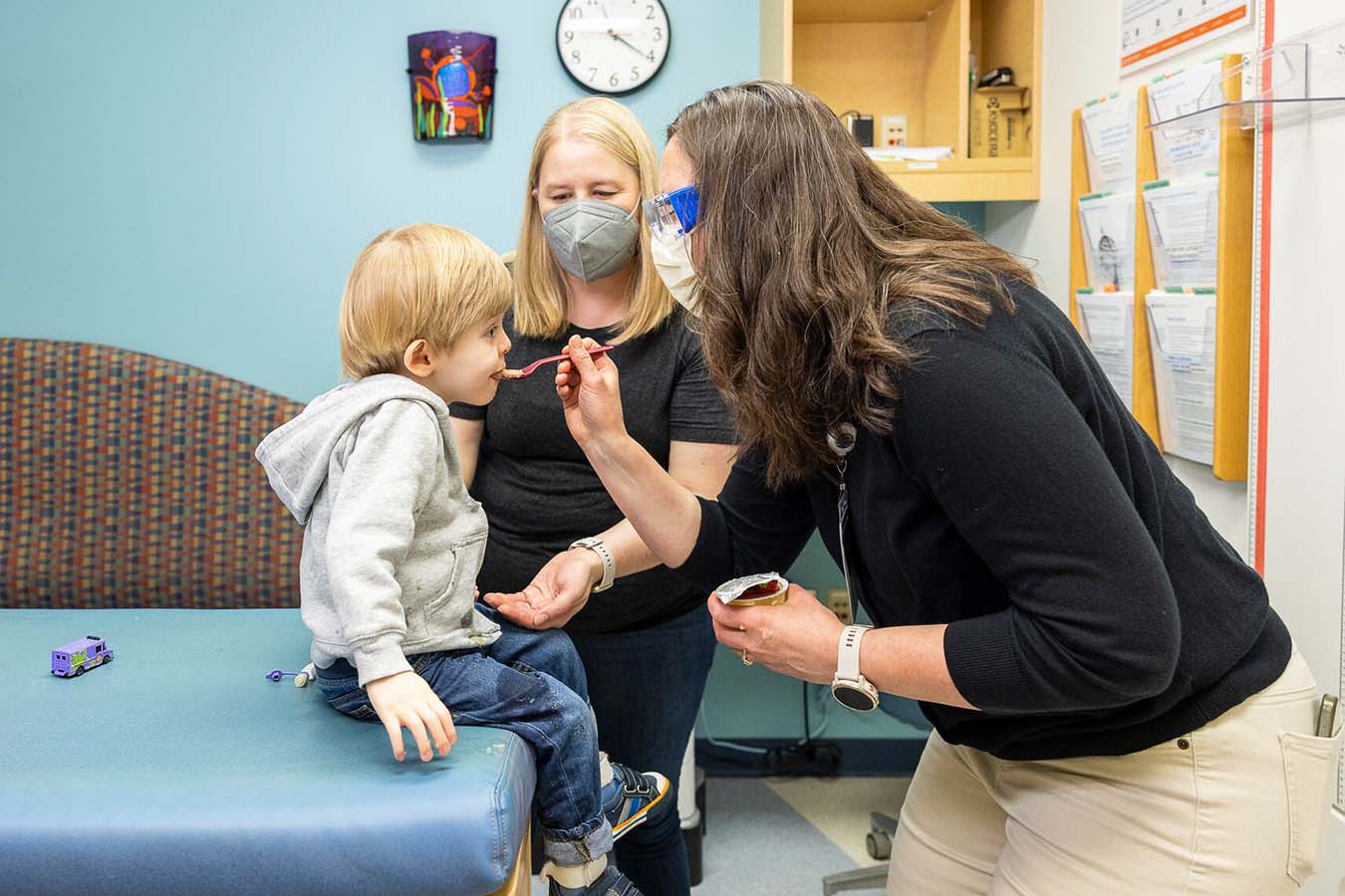 A Seattle Children's provider examines a patient