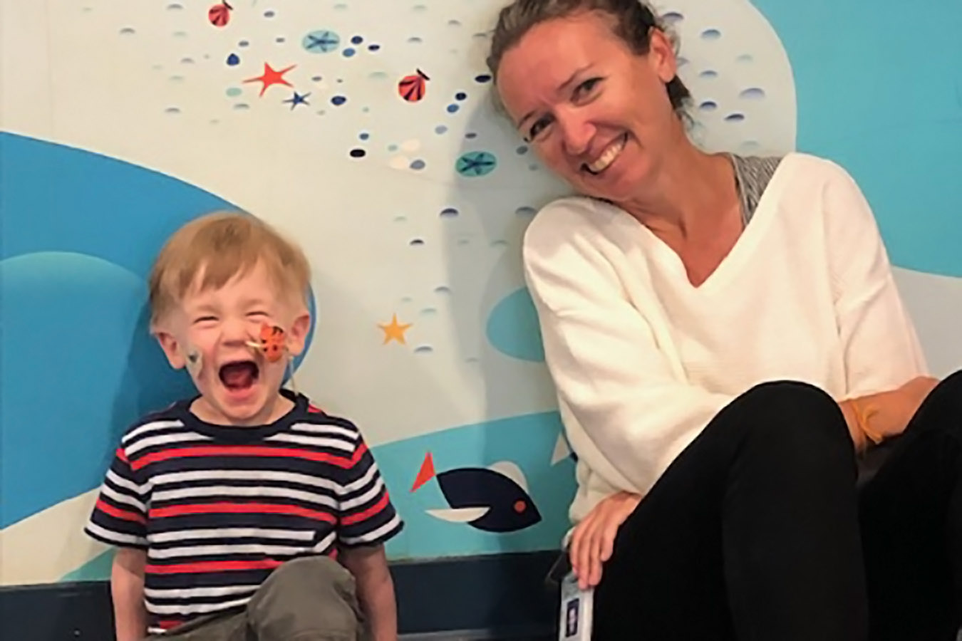 A boy and his mother at Seattle Children's Hospital