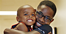 Two brothers hugging