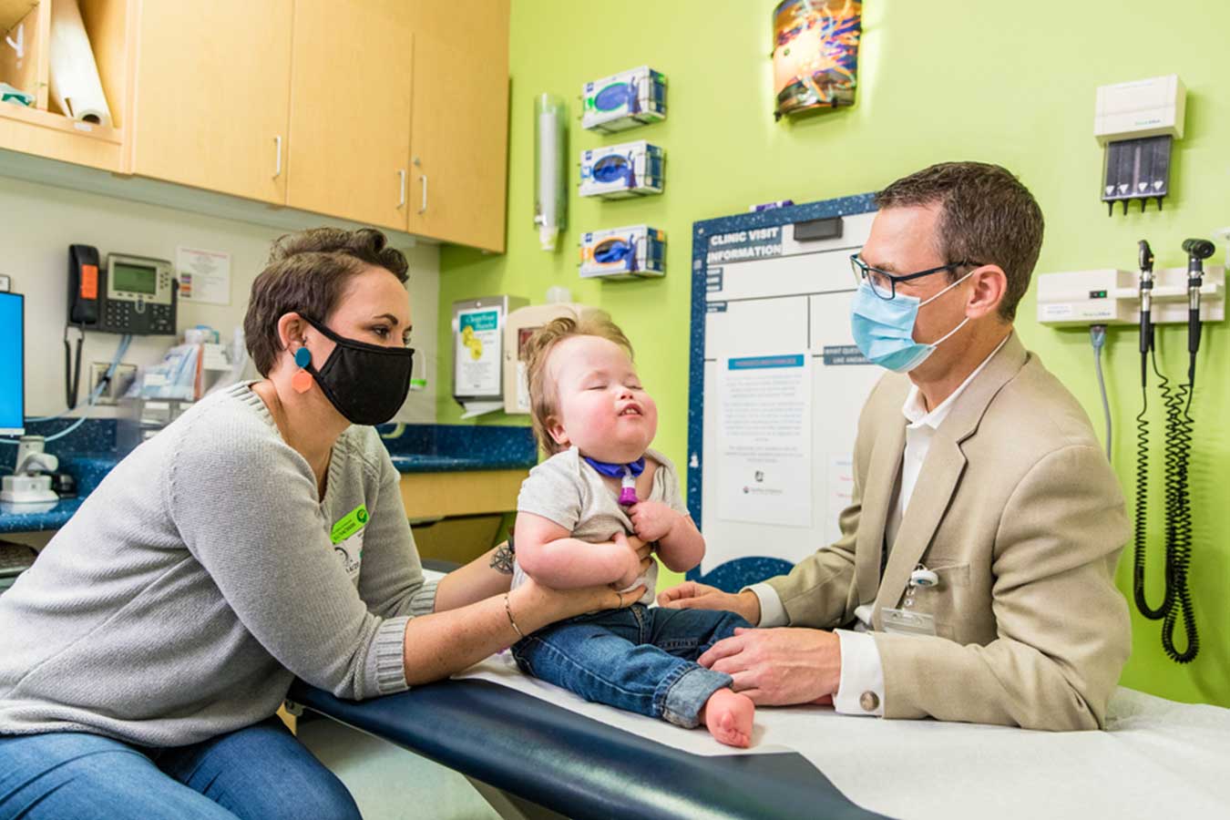 Dr McMullan examines a pediatric patient