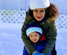 mom and kiddo in snow
