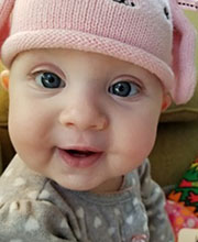 kiddo in pink hat