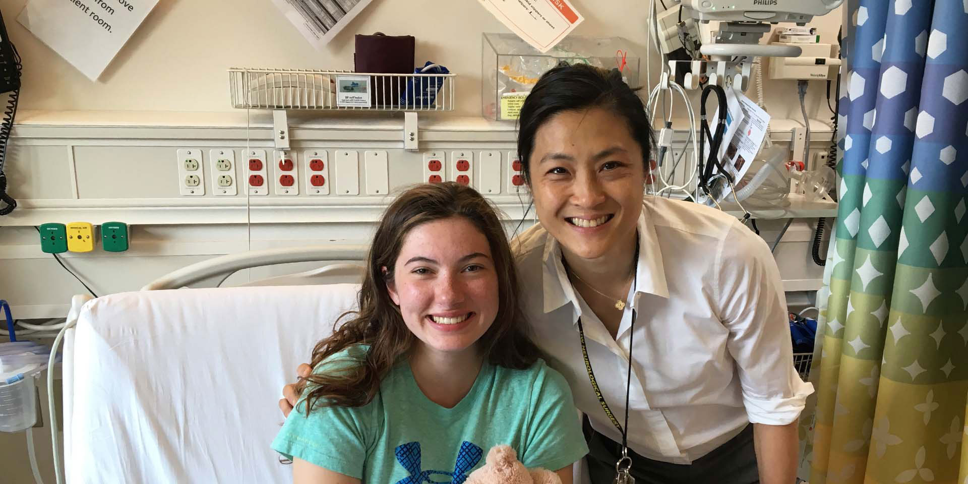 Seattle Children's Brain Tumor Program patient and physician smiling