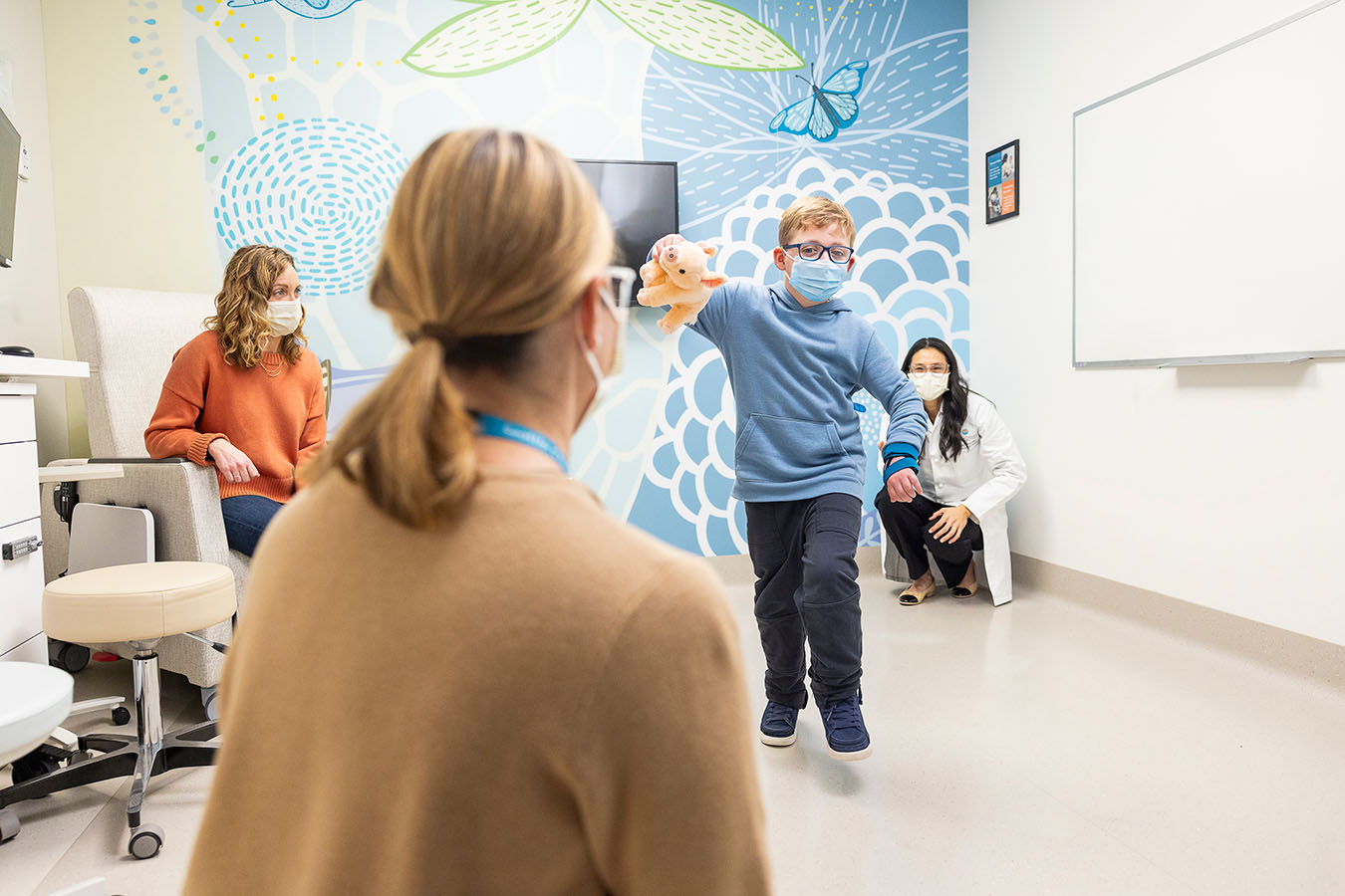 Dr. Amy Lee examines a patient's walk
