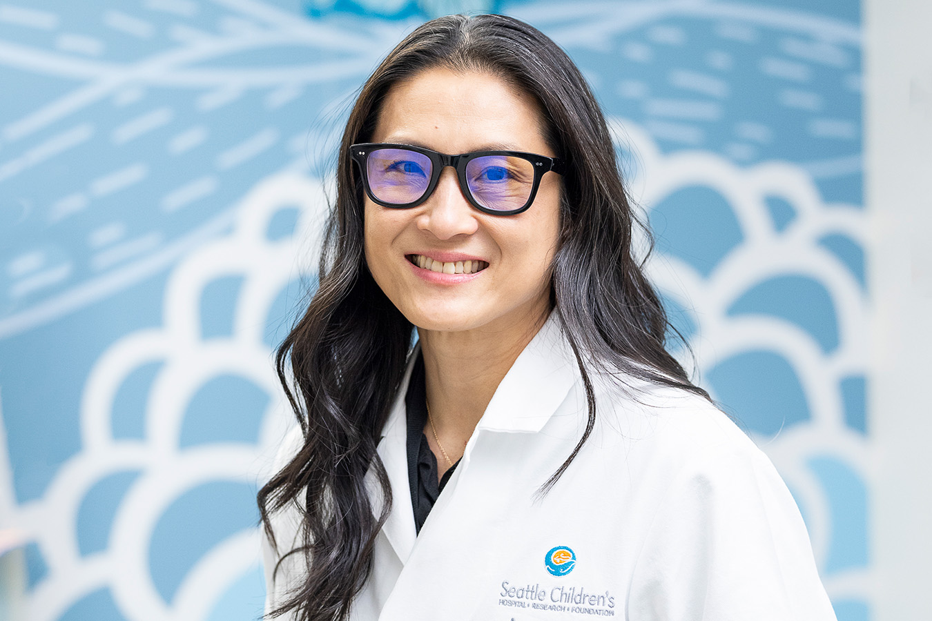 Dr. Lee in yellow sweater
