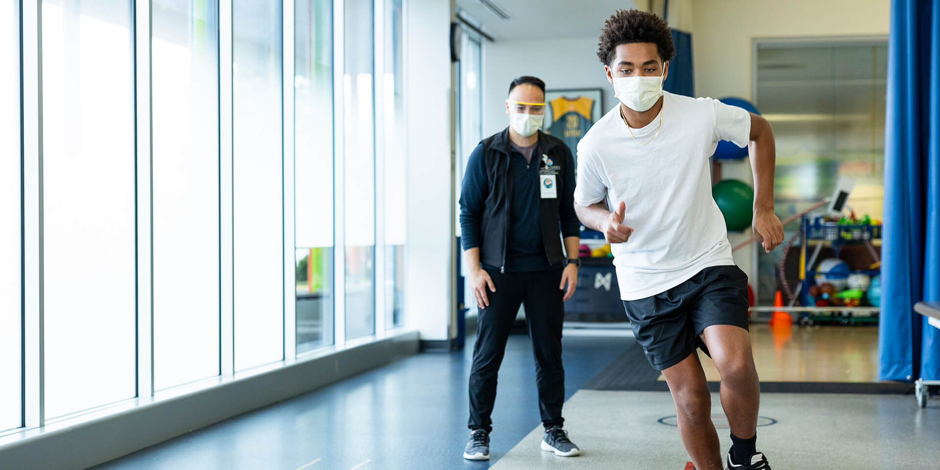 A young man running in the gym