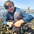 Xander at Meadowdale Beach in Edmonds with Tuft, the family’s dog
