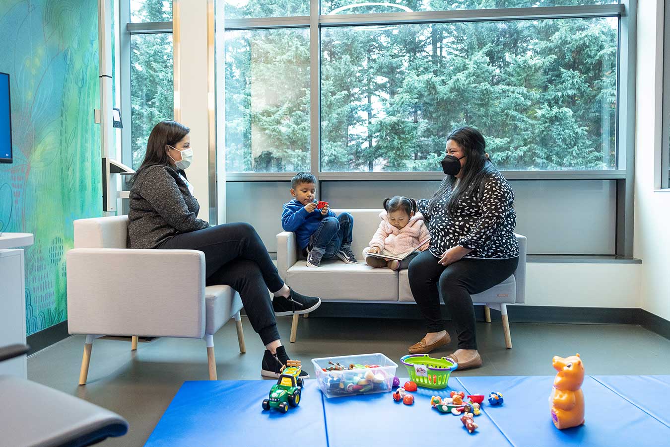 Dr Minjarez consults with a family at Seattle Children's Magnuson
