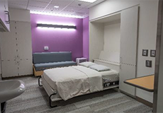 Sleep study suite with pull-out sleeper bed for parent.