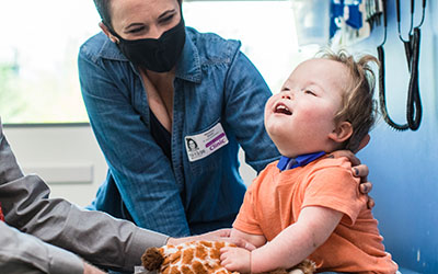 A boy with his mother at Seattle Children's