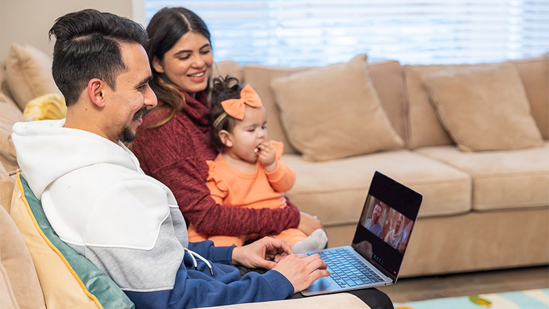 patient family looking providers on at computer screen