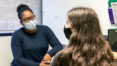 A Seattle Children's provider talking to a patient