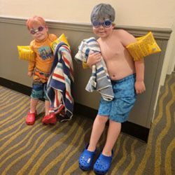 Two boys who had surgery for craniosynostosis at Seattle Children's ready to go swimming.