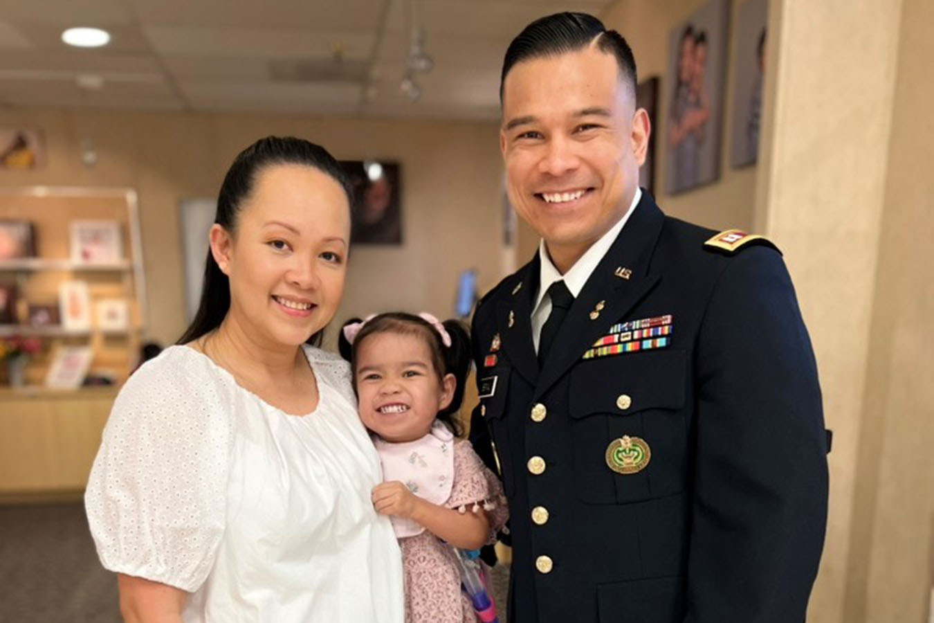 A mother, father and toddler girl