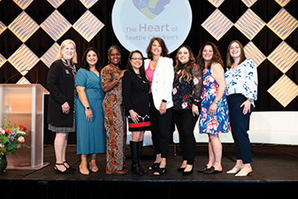 The Guild Annual Meeting and Luncheon was produced by the Guild Association team pictured here. From left, are Marie Jones, Nancy Hernandez, Carolyne Ojwang, Janice Brinschwitz, Aileen Kelly, Lilia Meza, Sarah Ladiges and Emily Downing.