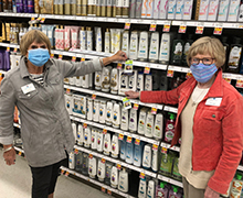 Vicki Nelson (left) and Muggins Ringstad were two of 26 Kent Guild members and friends who volunteered to tag products.