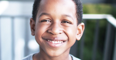 Headshot of Caleb smiling