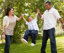 Parents playing with kiddo