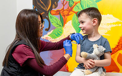 A boy receives a vaccination