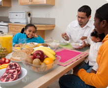 Family sitting around the dinner table