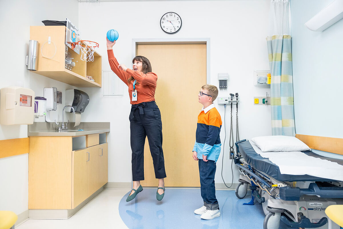 Declan and Dr. Randle playing ball in clinic