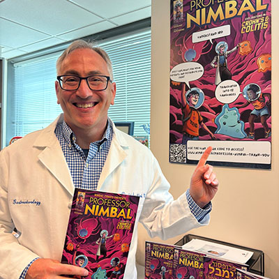 A doctor points his finger at a poster of the comic book titled "Professor Nimbal"