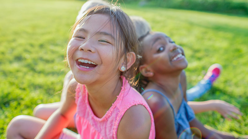 Girls play outside